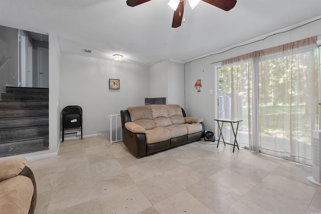 11801 Pleasant Frst, Little Rock, AR 72212 - living area featuring ceiling fan and stairs