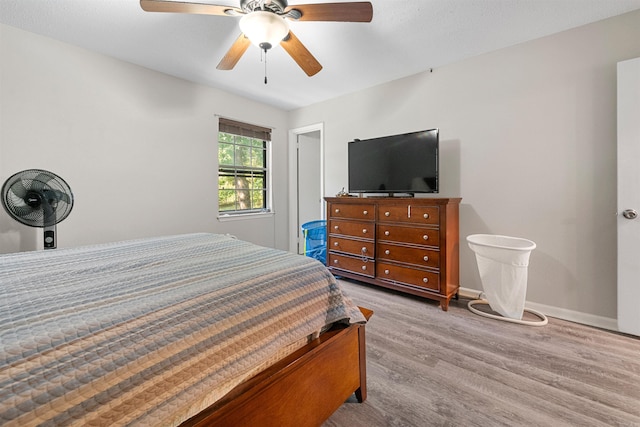 11801 Pleasant Frst, Little Rock, AR 72212 - bedroom featuring wood finished floors, baseboards, and a ceiling fan