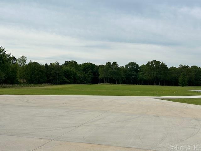 1656 Airport Dr, Mountain View, AR 72560 - view of concrete road featuring a wooded view