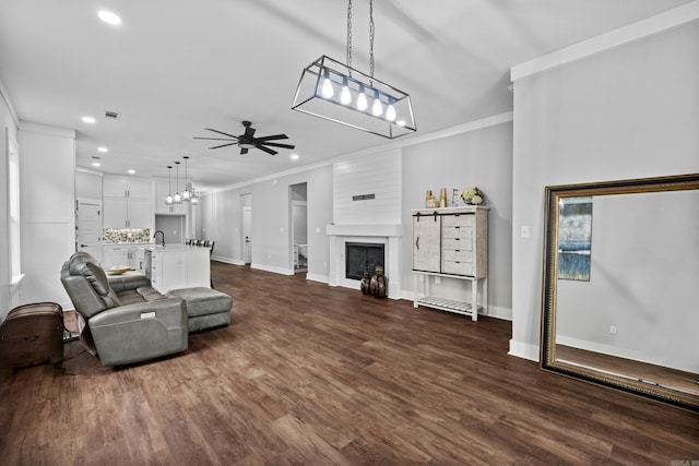 81 Fletcher Ridge Dr, Little Rock, AR 72223 - living area featuring ornamental molding, recessed lighting, ceiling fan, baseboards, and dark wood-style floors