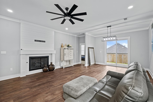 81 Fletcher Ridge Dr, Little Rock, AR 72223 - living room with recessed lighting, a fireplace, ceiling fan, ornamental molding, and wood finished floors