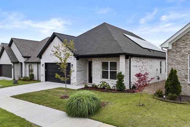 81 Fletcher Ridge Dr, Little Rock, AR 72223 - french country inspired facade featuring driveway, a garage, a front lawn, brick siding, and roof with shingles