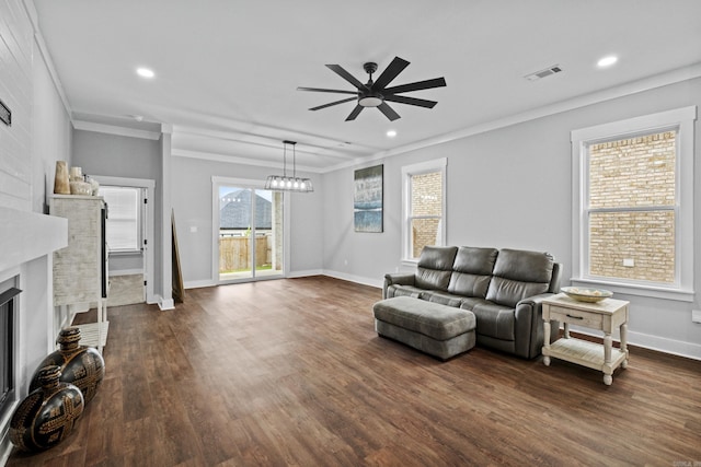 81 Fletcher Ridge Dr, Little Rock, AR 72223 - living area featuring ceiling fan, crown molding, dark wood-type flooring, baseboards, and recessed lighting
