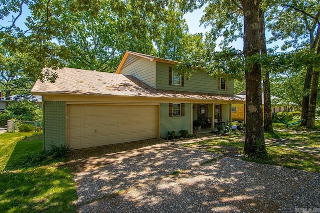2006 Gunpowder Rd, Little Rock, AR 72227 - traditional-style house with brick siding, driveway, and a garage