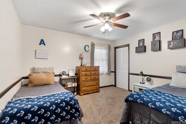 2006 Gunpowder Rd, Little Rock, AR 72227 - carpeted bedroom with a closet, a ceiling fan, and baseboards