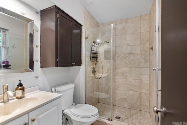 2006 Gunpowder Rd, Little Rock, AR 72227 - bathroom featuring toilet, vanity, and a stall shower