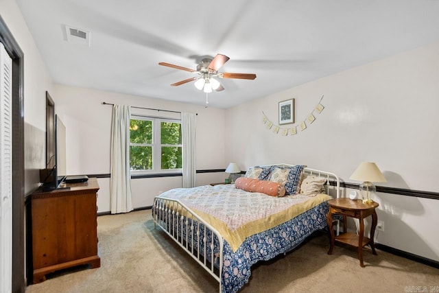 2006 Gunpowder Rd, Little Rock, AR 72227 - carpeted bedroom featuring baseboards and a ceiling fan