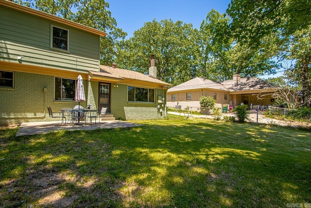 2006 Gunpowder Rd, Little Rock, AR 72227 - view of yard featuring a patio and entry steps