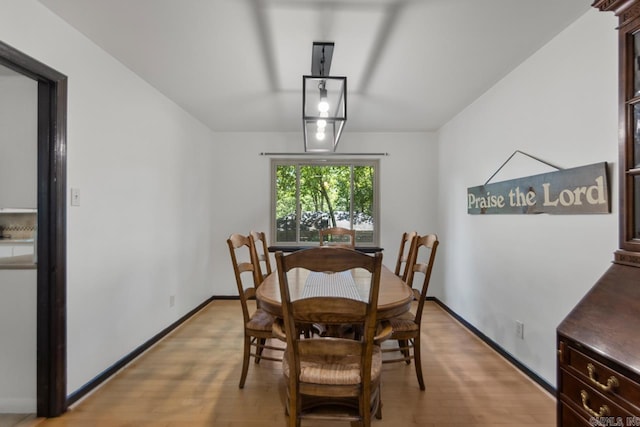 2006 Gunpowder Rd, Little Rock, AR 72227 - dining area with light wood finished floors and baseboards