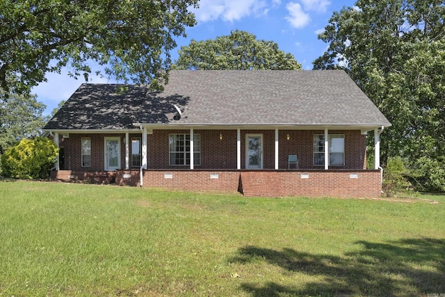 50 Merritt Trl, Greenbrier, AR 72058 - view of front of home featuring brick siding, a front lawn, and roof with shingles