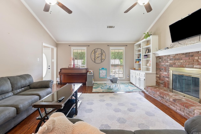 1 Forest Brook Ct, Little Rock, AR 72211 - living room featuring a ceiling fan, lofted ceiling, wood finished floors, crown molding, and a fireplace