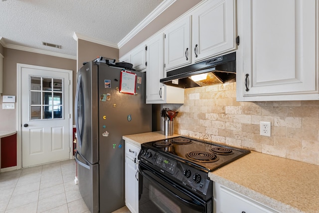 1 Forest Brook Ct, Little Rock, AR 72211 - kitchen with black range with electric stovetop, under cabinet range hood, freestanding refrigerator, white cabinetry, and light countertops