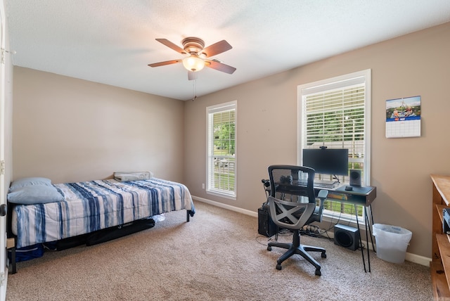 1 Forest Brook Ct, Little Rock, AR 72211 - bedroom with carpet floors, baseboards, ceiling fan, and an office area