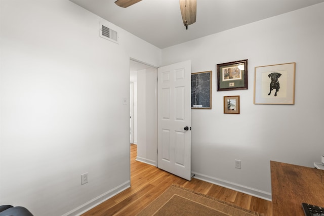 8010 Iowa Dr, Little Rock, AR 72227 - unfurnished bedroom with light wood-style floors, baseboards, and a ceiling fan