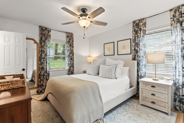 8010 Iowa Dr, Little Rock, AR 72227 - bedroom featuring light wood finished floors and ceiling fan