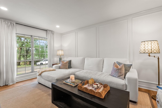 8010 Iowa Dr, Little Rock, AR 72227 - living area with a decorative wall, light wood-type flooring, and recessed lighting