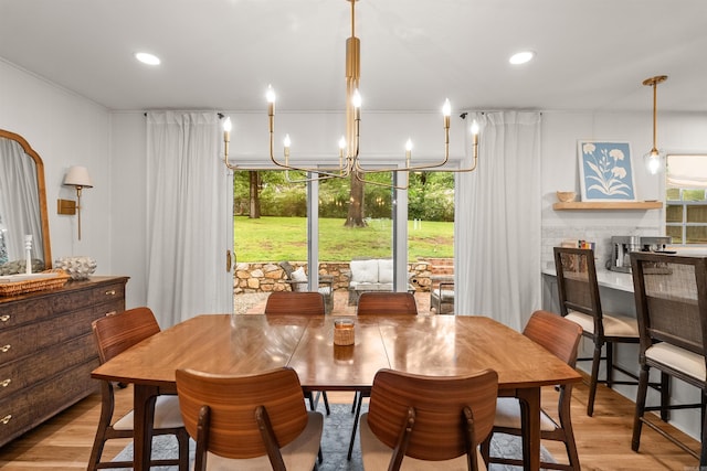 8010 Iowa Dr, Little Rock, AR 72227 - dining room featuring light wood-style flooring, a chandelier, and recessed lighting