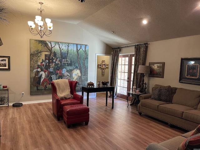 284 Grant 167077, Sheridan, AR 72150 - living area featuring wood finished floors, lofted ceiling, a chandelier, and baseboards