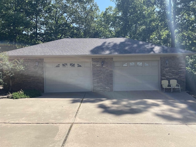 284 Grant 167077, Sheridan, AR 72150 - garage featuring concrete driveway