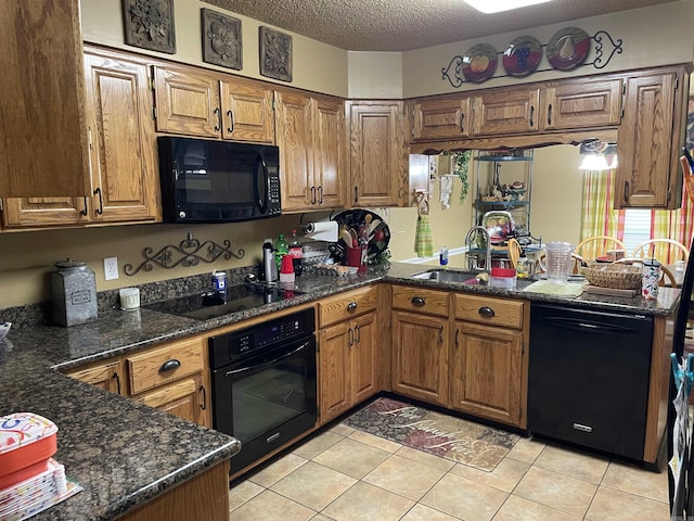 284 Grant 167077, Sheridan, AR 72150 - kitchen with black appliances, a sink, brown cabinets, and a textured ceiling
