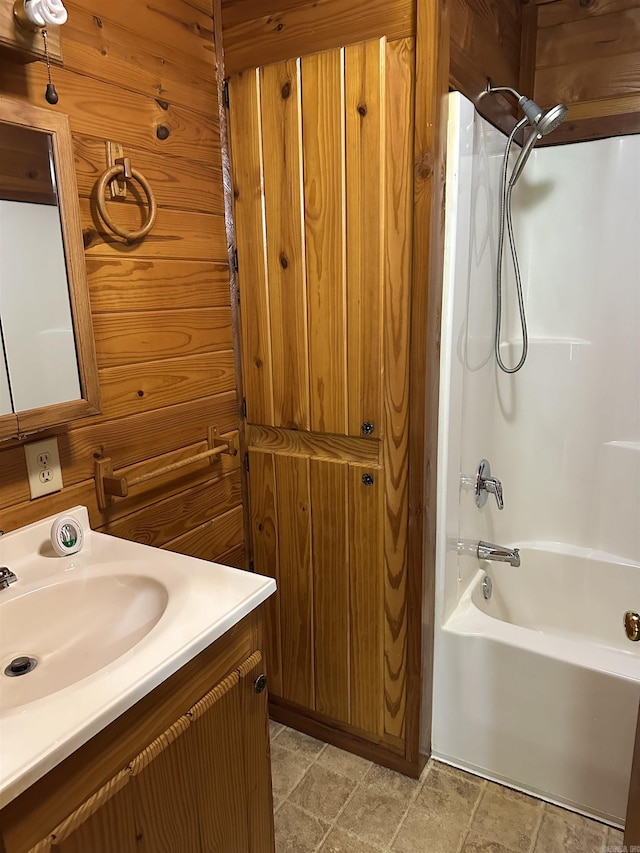 540 Polk Rd 78, Mena, AR 71953 - full bath with vanity, bathtub / shower combination, and stone finish floors