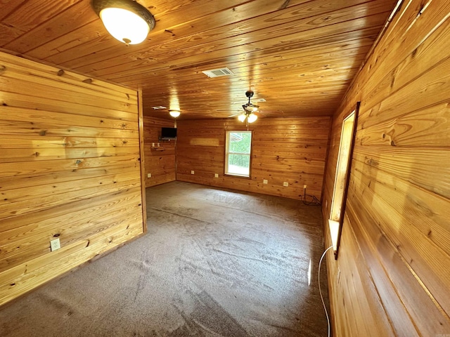 540 Polk Rd 78, Mena, AR 71953 - carpeted empty room with wooden ceiling and wood walls