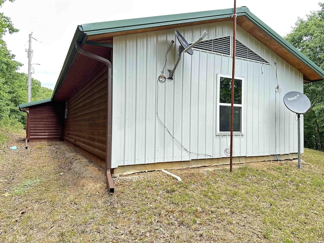 540 Polk Rd 78, Mena, AR 71953 - view of side of property with board and batten siding