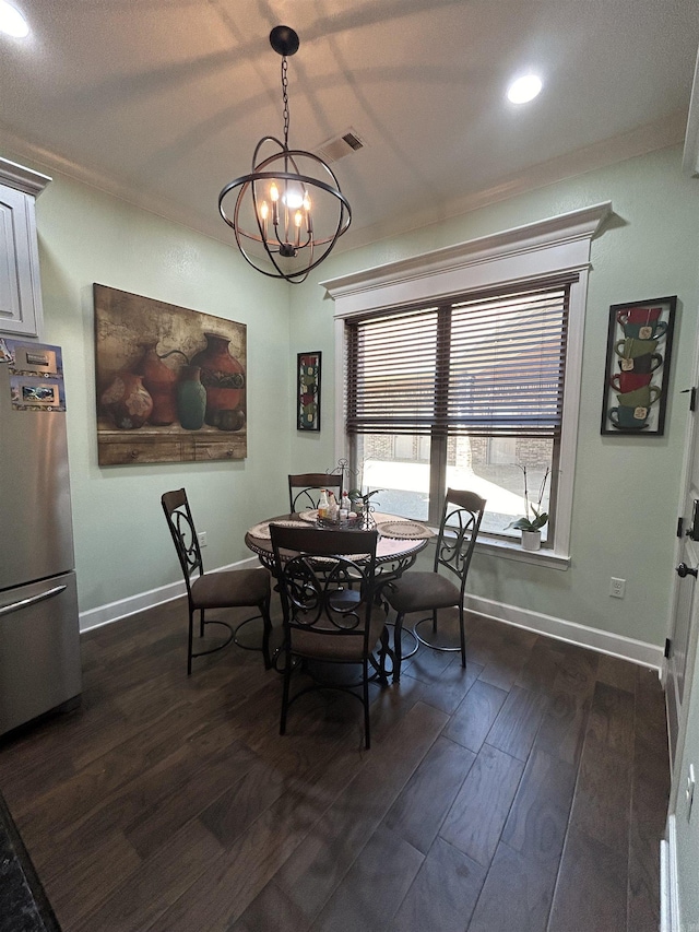 23 Whispering Dr, Alexander, AR 72002 - dining area featuring dark wood-style flooring, baseboards, a chandelier, crown molding, and recessed lighting