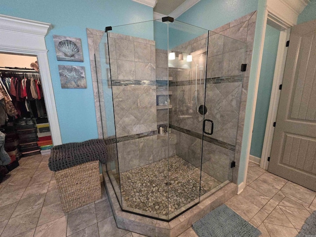 23 Whispering Dr, Alexander, AR 72002 - bathroom with a shower stall and a walk in closet