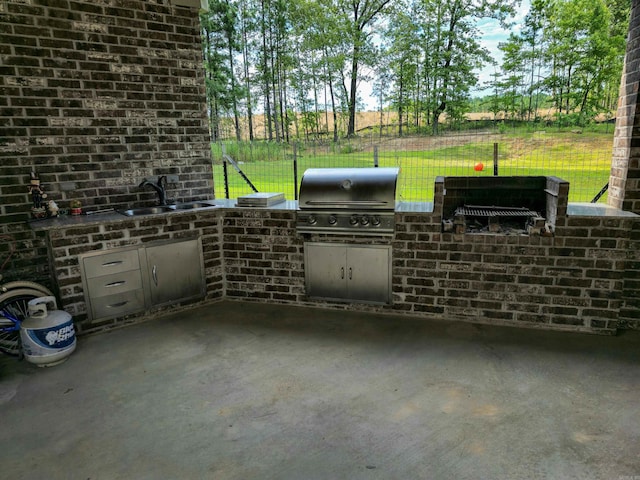 23 Whispering Dr, Alexander, AR 72002 - view of patio / terrace with a sink