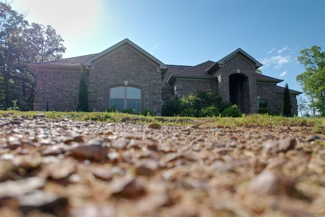 23 Whispering Dr, Alexander, AR 72002 - view of front of home with brick siding