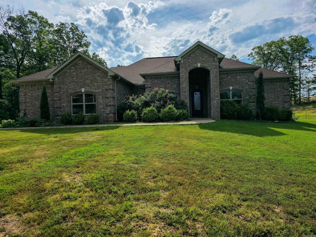 23 Whispering Dr, Alexander, AR 72002 - french country inspired facade featuring a front lawn and brick siding
