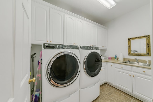 43 Earnhardt Cir, Cabot, AR 72023 - laundry room featuring washer and clothes dryer, cabinet space, and light tile patterned floors