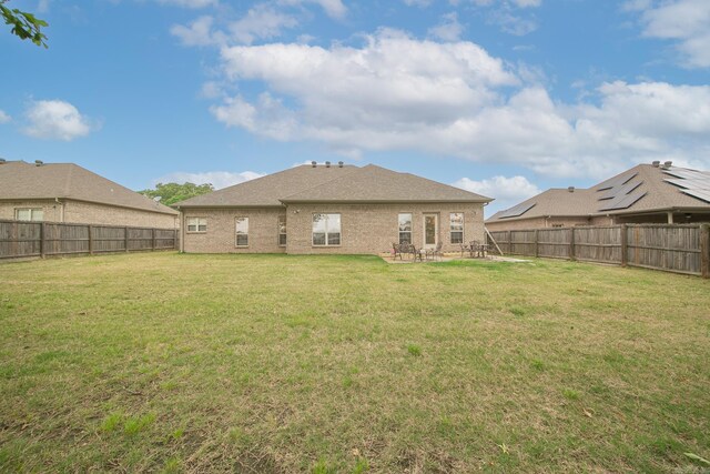 43 Earnhardt Cir, Cabot, AR 72023 - rear view of property featuring a patio and brick siding