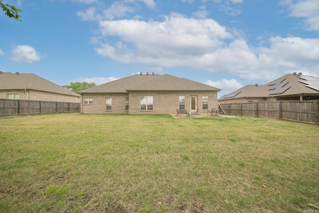 43 Earnhardt Cir, Cabot, AR 72023 - rear view of property featuring a patio and brick siding