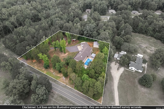 10820 W Sardis Rd, Bauxite, AR 72011 - aerial view of property and surrounding area featuring a forest, a pool, and property boundaries highlighted