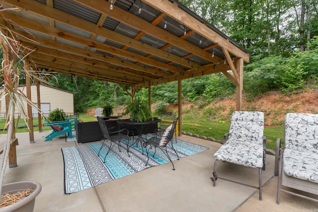 10820 W Sardis Rd, Bauxite, AR 72011 - view of patio / terrace with outdoor dining space and an outdoor structure
