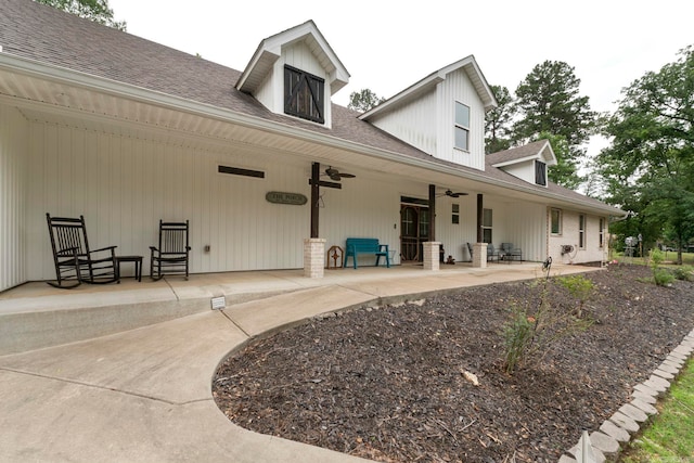 10820 W Sardis Rd, Bauxite, AR 72011 - back of property featuring ceiling fan, a patio, and a shingled roof