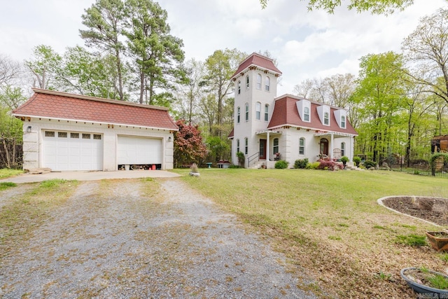 1112 Lawrence Ln, Benton, AR 72019 - view of front of house with mansard roof, driveway, a garage, a front yard, and an outbuilding