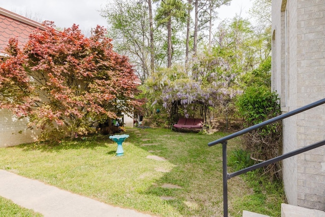 1112 Lawrence Ln, Benton, AR 72019 - view of green lawn featuring a balcony