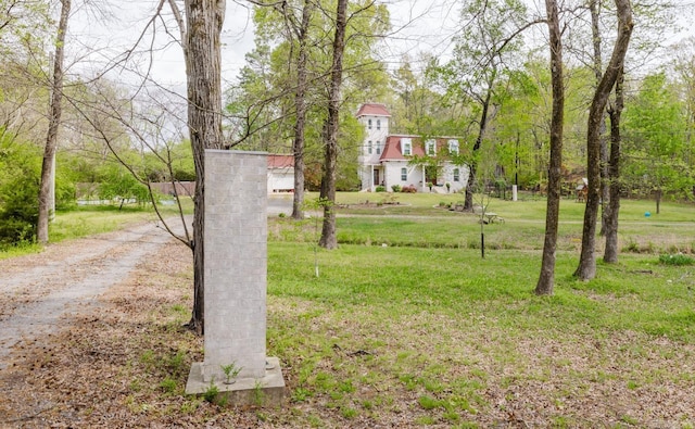 1112 Lawrence Ln, Benton, AR 72019 - view of green lawn with driveway