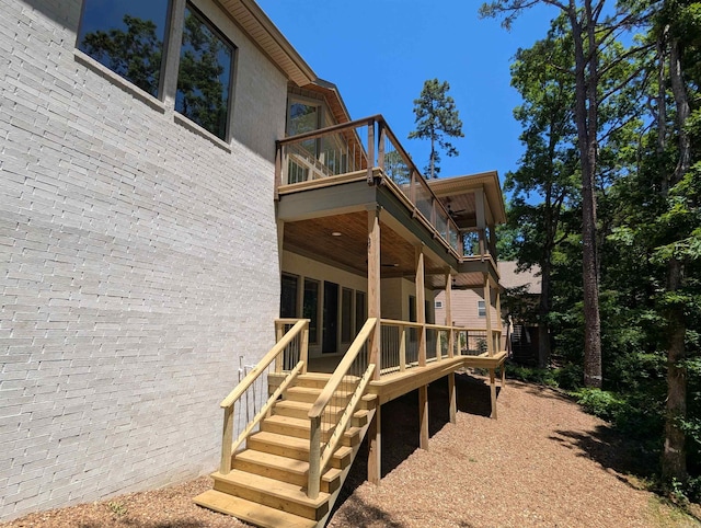 80 Stone Cir, Greers Ferry, AR 72067 - rear view of property with a balcony, a wooden deck, and stairway