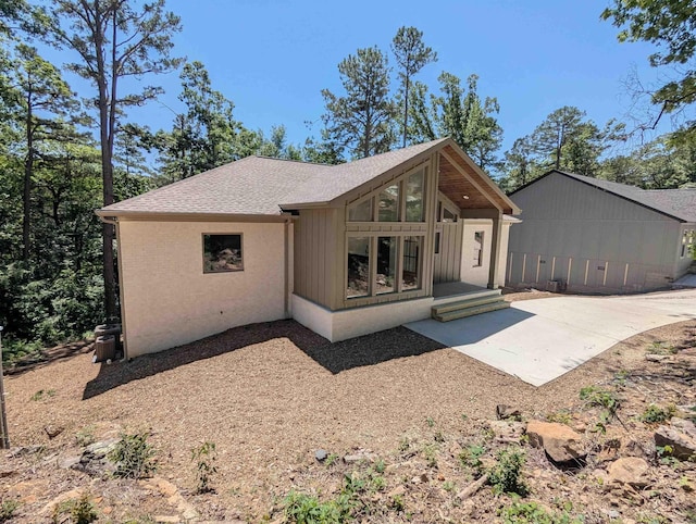 80 Stone Cir, Greers Ferry, AR 72067 - rear view of property with a patio and roof with shingles