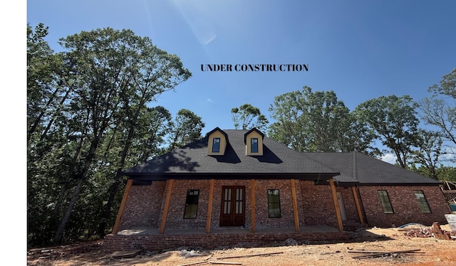 233 Clear View Dr, Benton, AR 72019 - view of front of property featuring brick siding, a porch, and a shingled roof