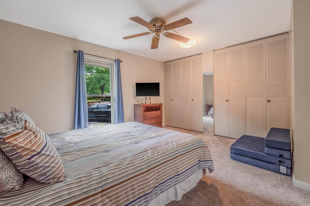 100 Discovery Bay Ln Unit 6, Hot Springs, AR 71913 - bedroom with multiple closets, light carpet, and ceiling fan