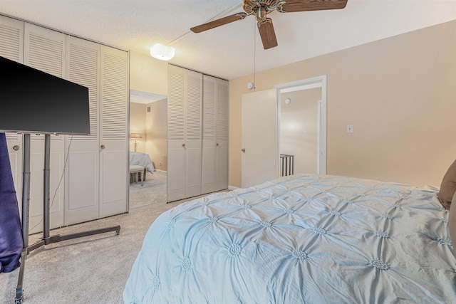 100 Discovery Bay Ln Unit 6, Hot Springs, AR 71913 - carpeted bedroom featuring ceiling fan and two closets