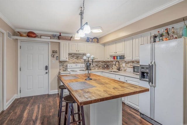 100 Discovery Bay Ln Unit 6, Hot Springs, AR 71913 - kitchen with white appliances, wood counters, a sink, white cabinetry, and dark wood finished floors