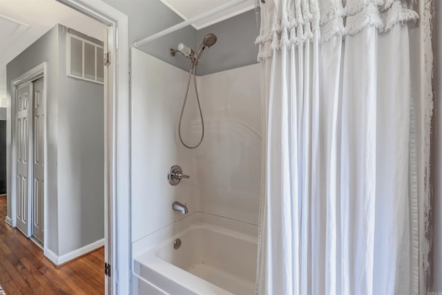 64 Castleberry Rd, Greenbrier, AR 72058 - bathroom with shower / bath combo, wood finished floors, and baseboards