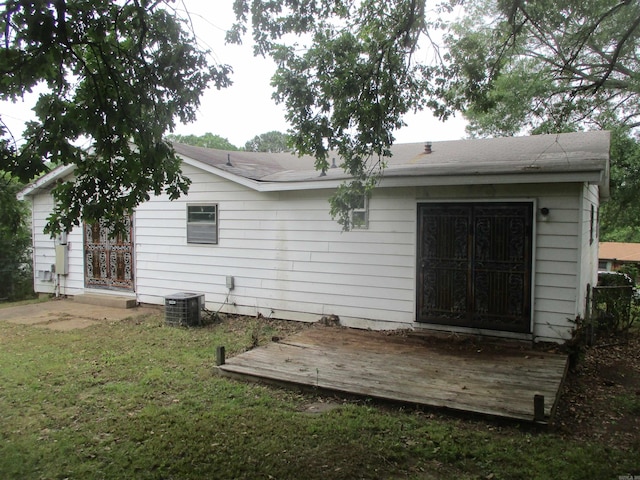 1407 E 38th St, Little Rock, AR 72206 - rear view of property with a deck, a yard, and cooling unit
