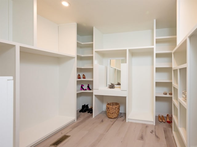 15 Brandywine Ln, Little Rock, AR 72227 - walk in closet featuring wood finished floors